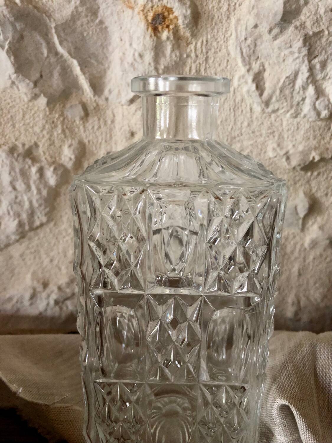 Large ornate glass carafe