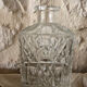 Large ornate glass carafe