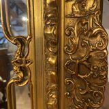 Mirror in wood and gilded stucco