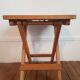 Folding stool made of solid wood