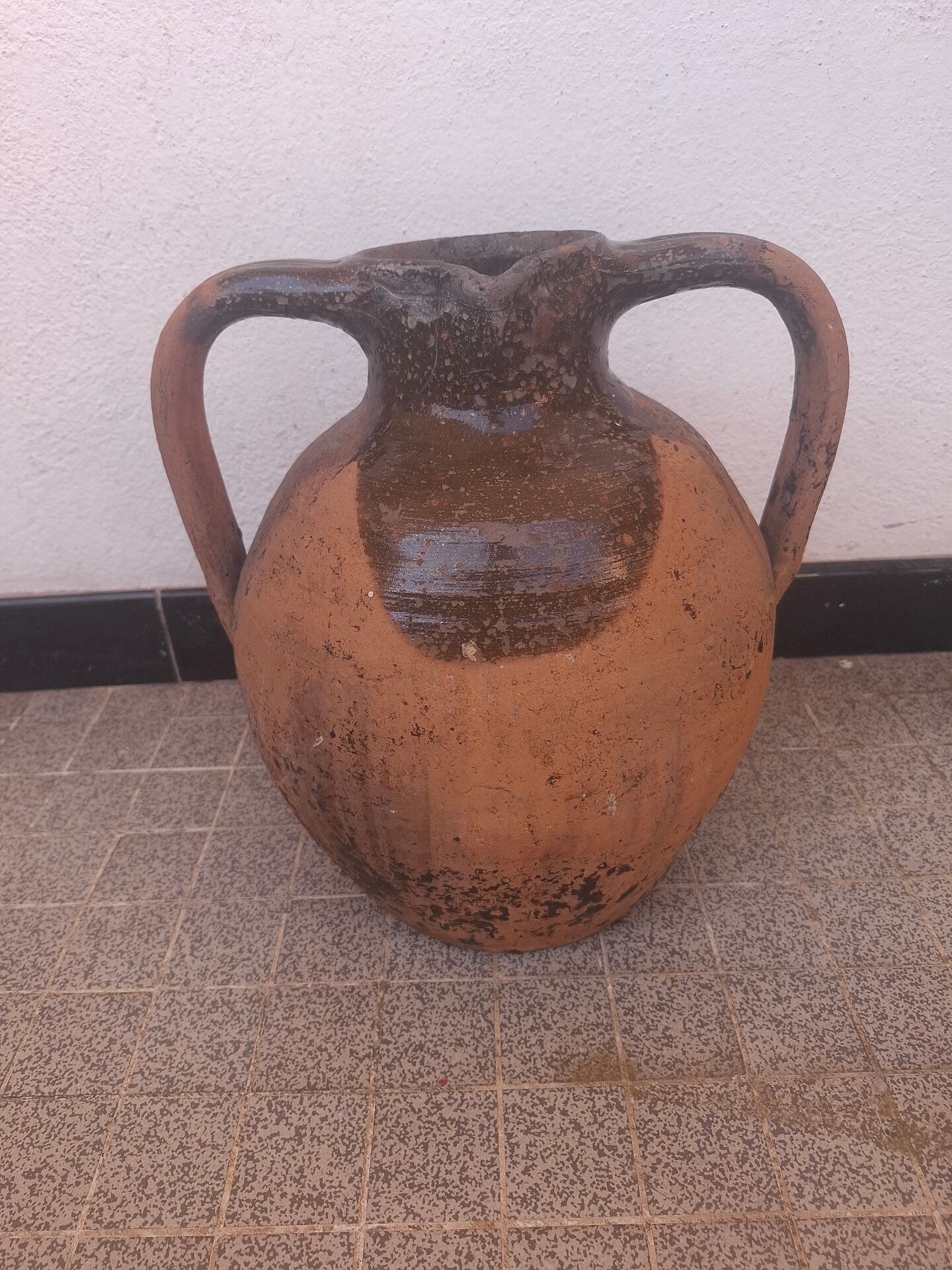 Jug, I stop at glazed terracotta oil.