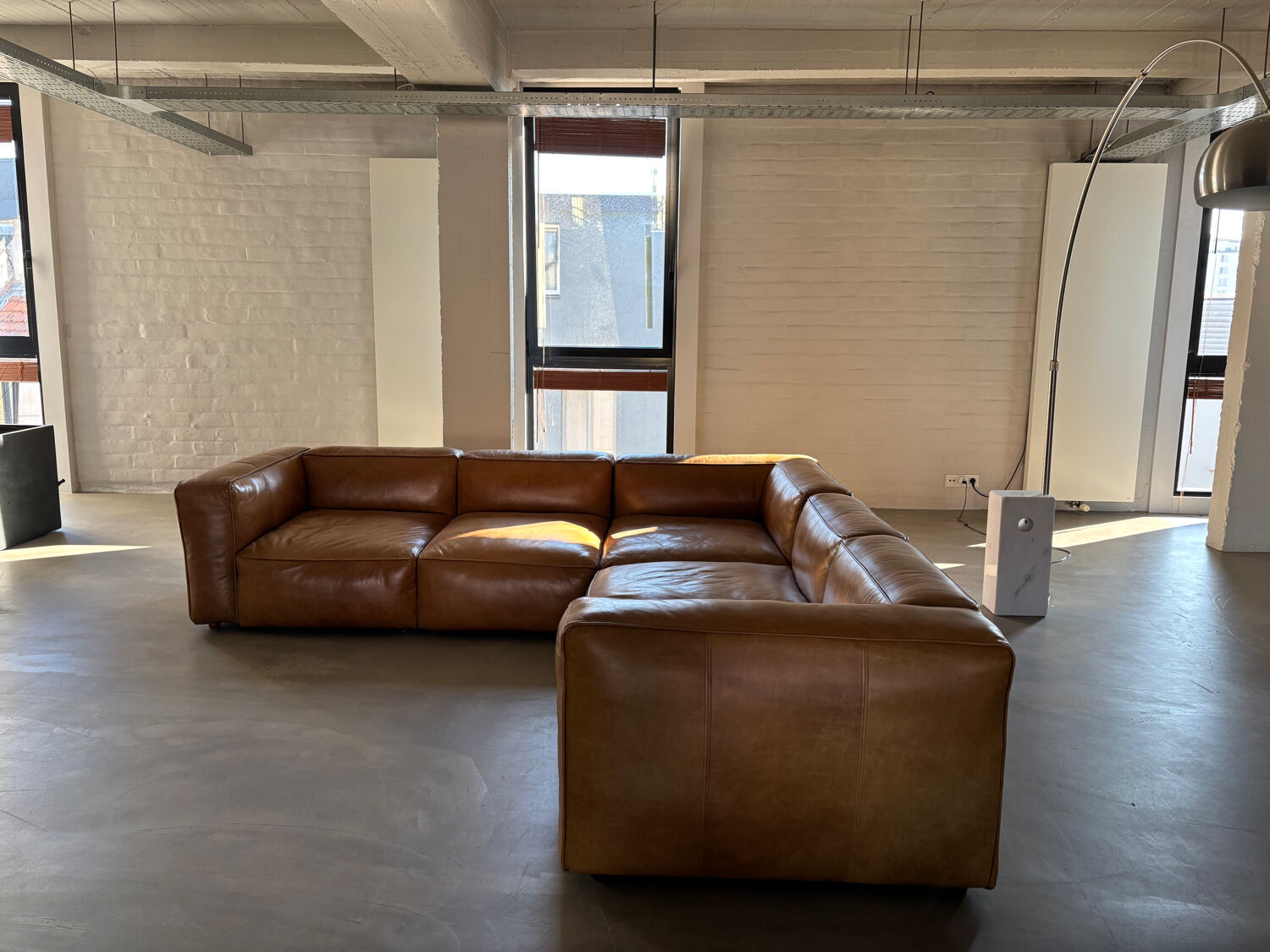 Modular corner sofa + pouf/ottoman in cognac Buffalo leather