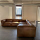 Modular corner sofa + pouf/ottoman in cognac Buffalo leather