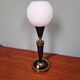 Black lacquered metal table lamp with satin white glass, 1950s.