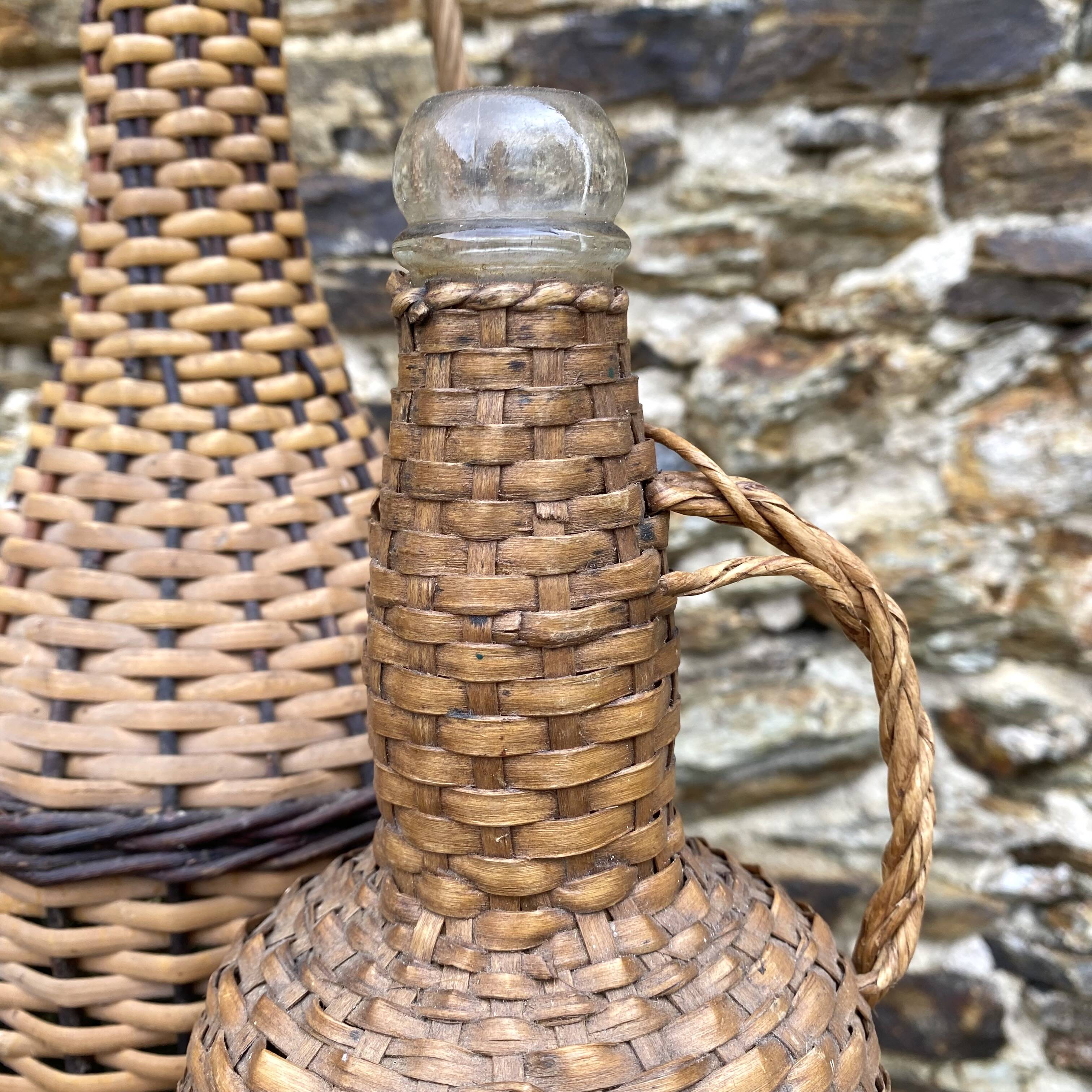 Glass bottles and rattan, woven wicker