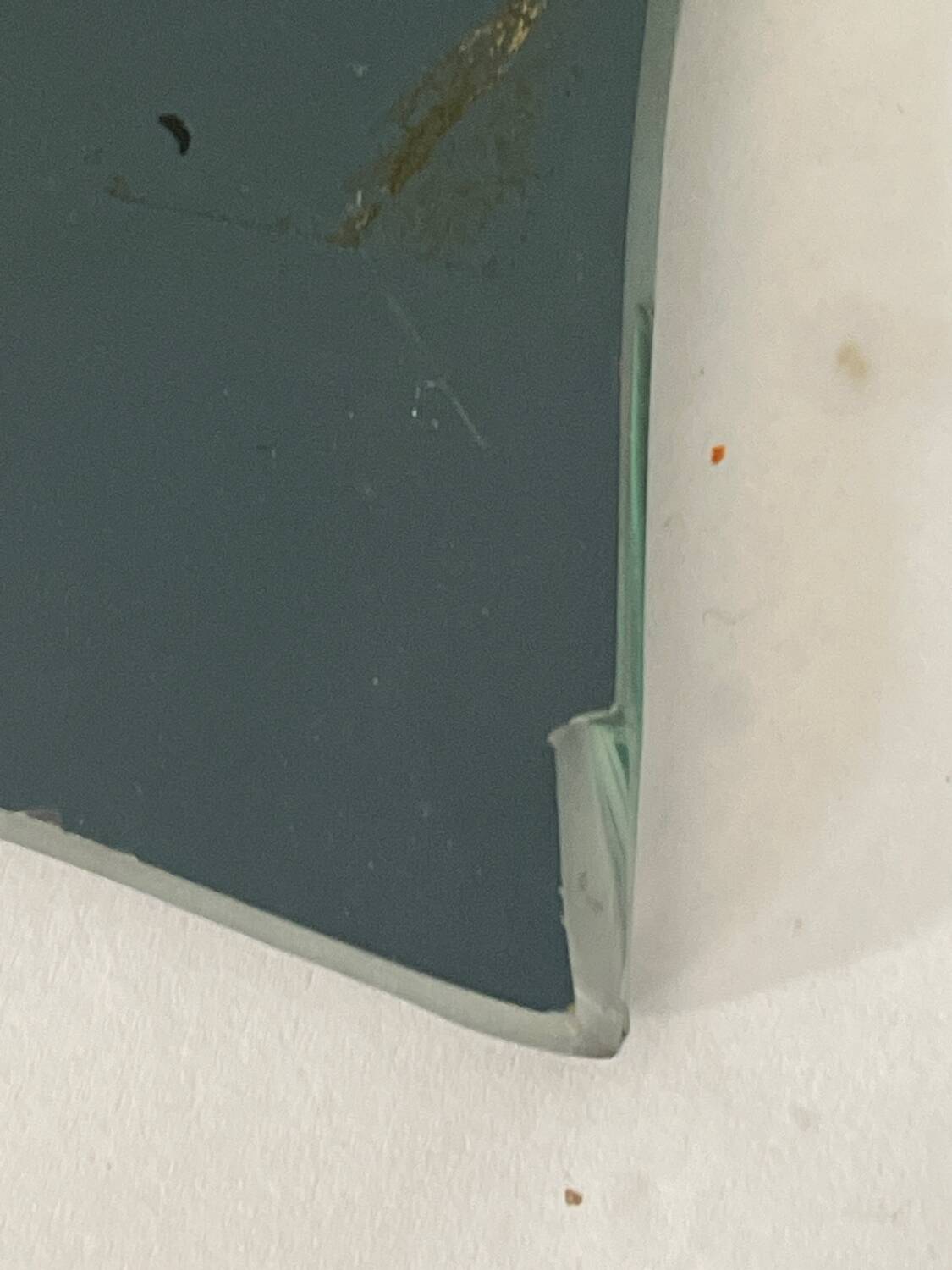 Free-form mirror signed Mathias 55x59cm