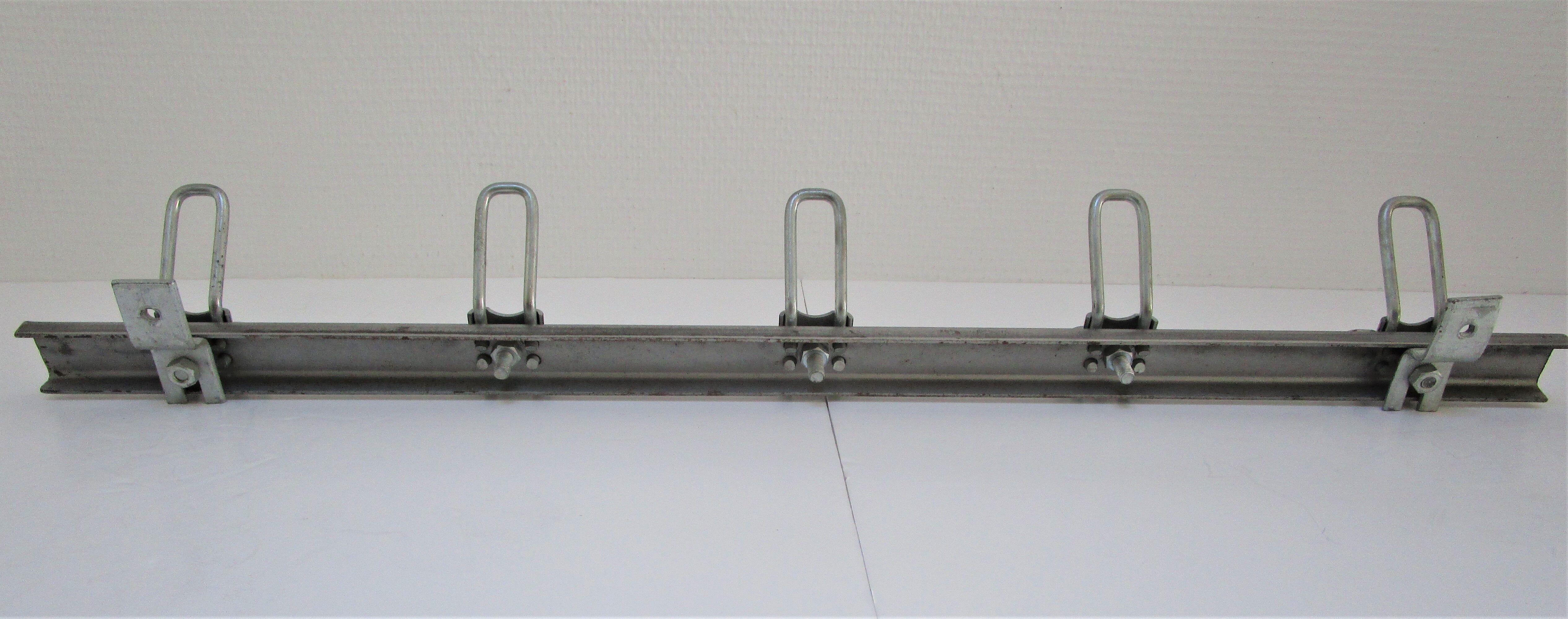 Vintage school wall rack in patinated steel