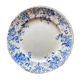 Vintage round dish in iron earth