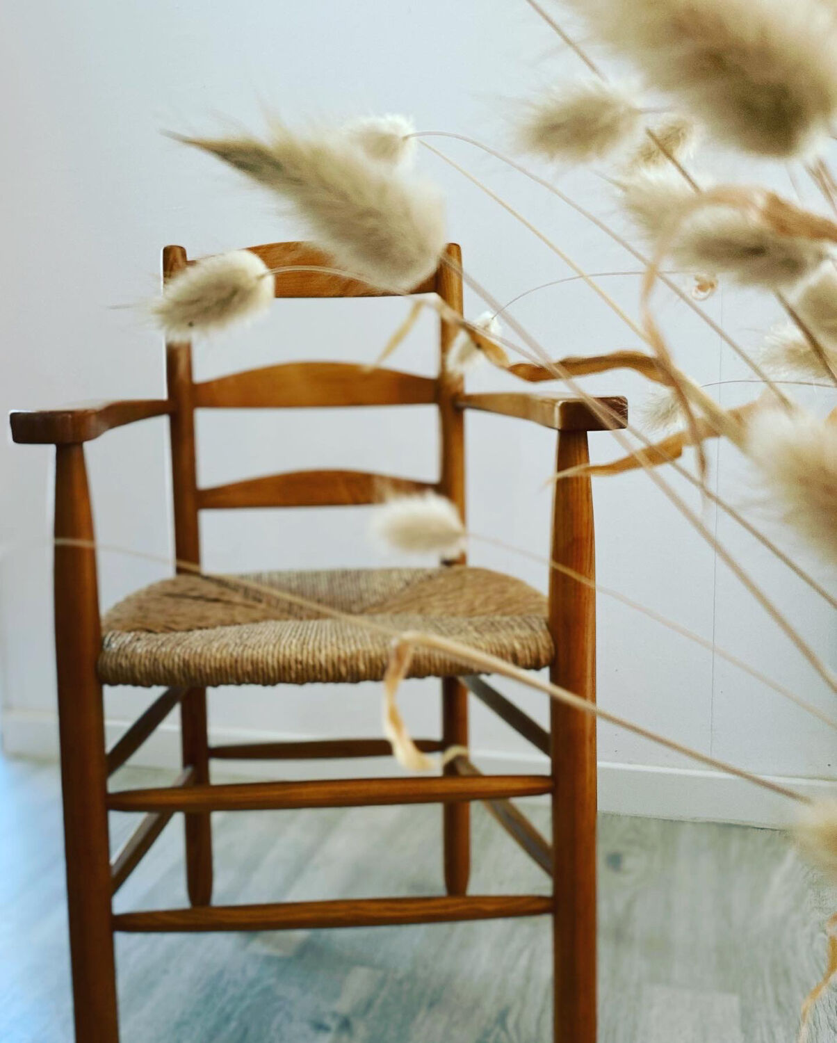 Wooden and straw armchair