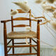 Wooden and straw armchair