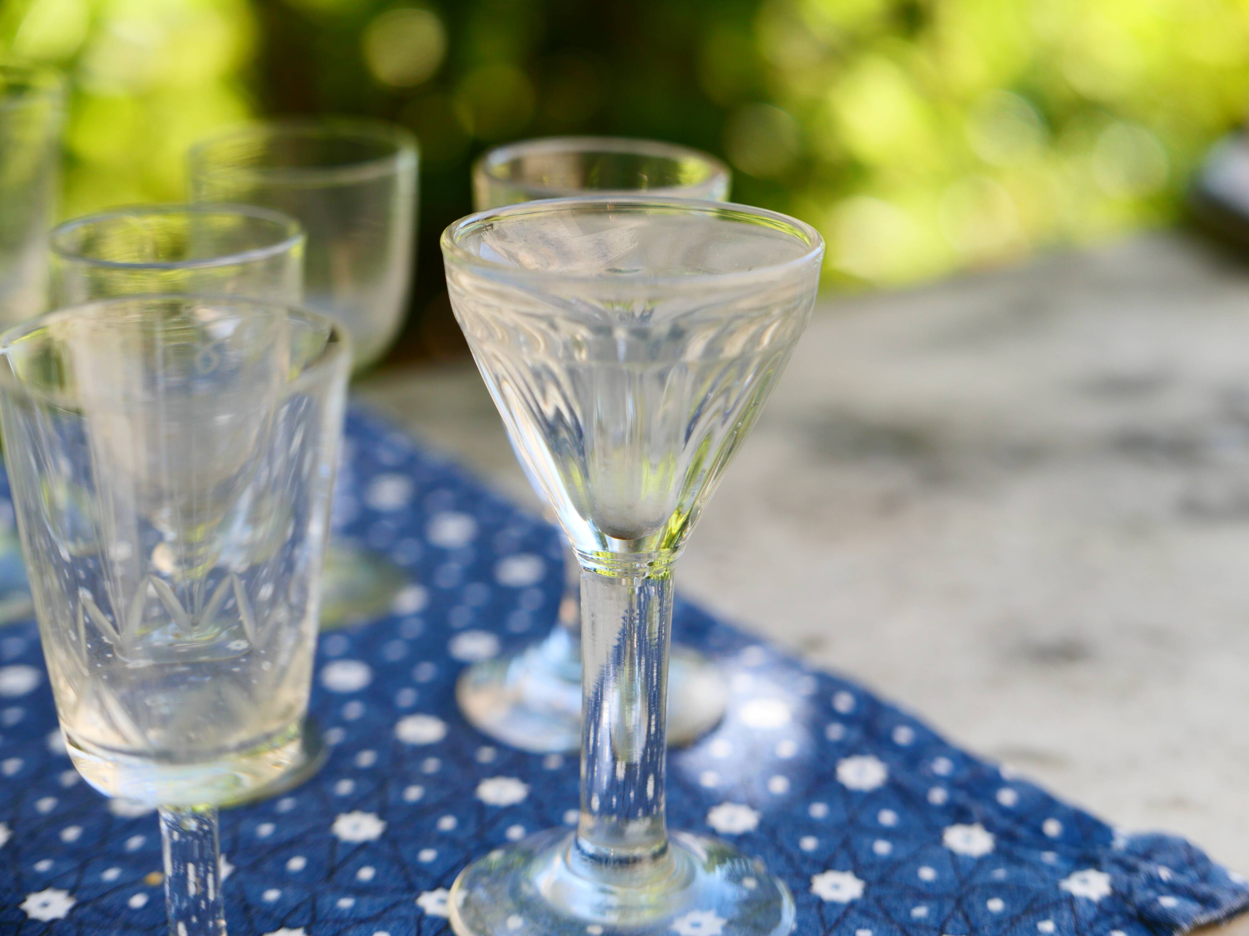 Assortment of 15 mismatched vintage liqueur glasses
