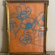 Gouache painting of blue flowers on an orange background