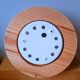 Wall light in pine and white opal.