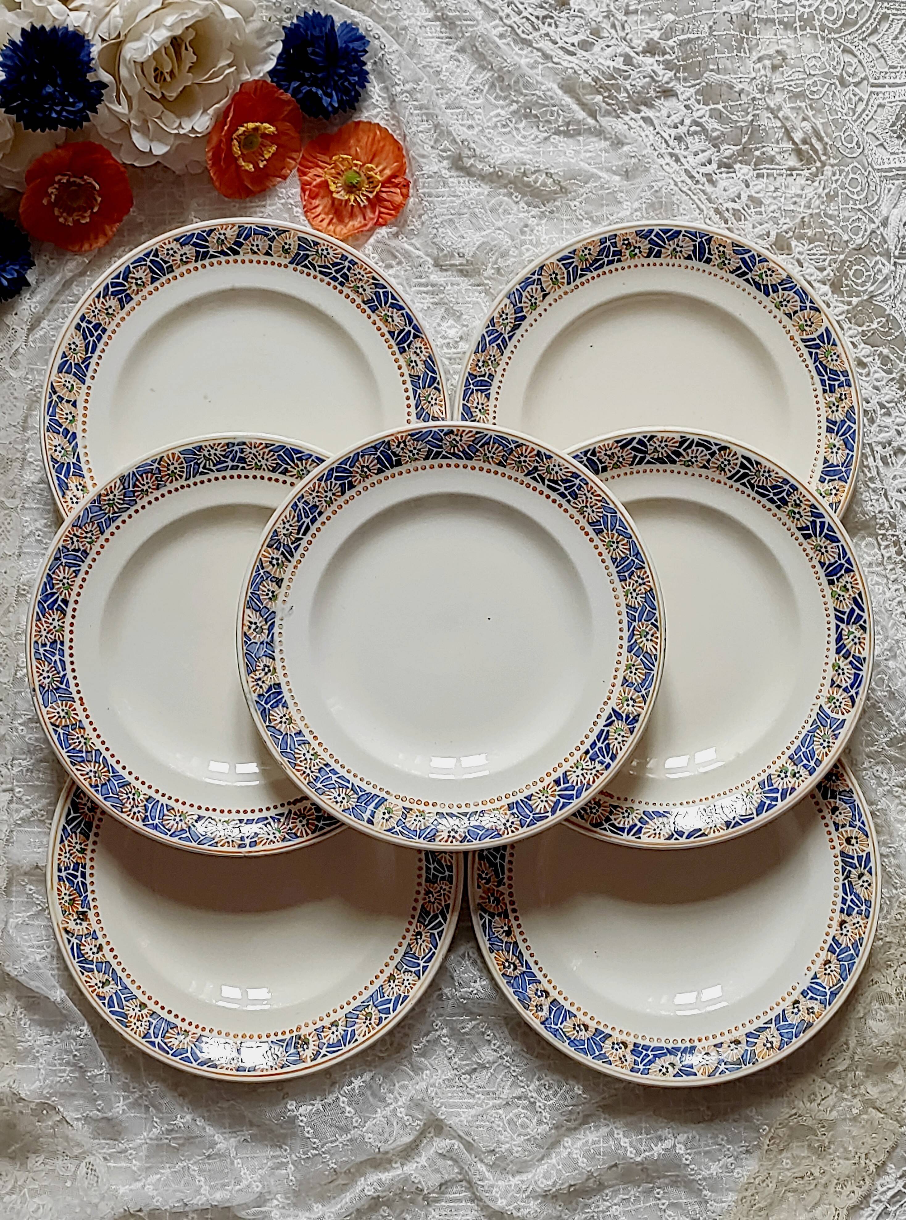 7 Old Longwy plates