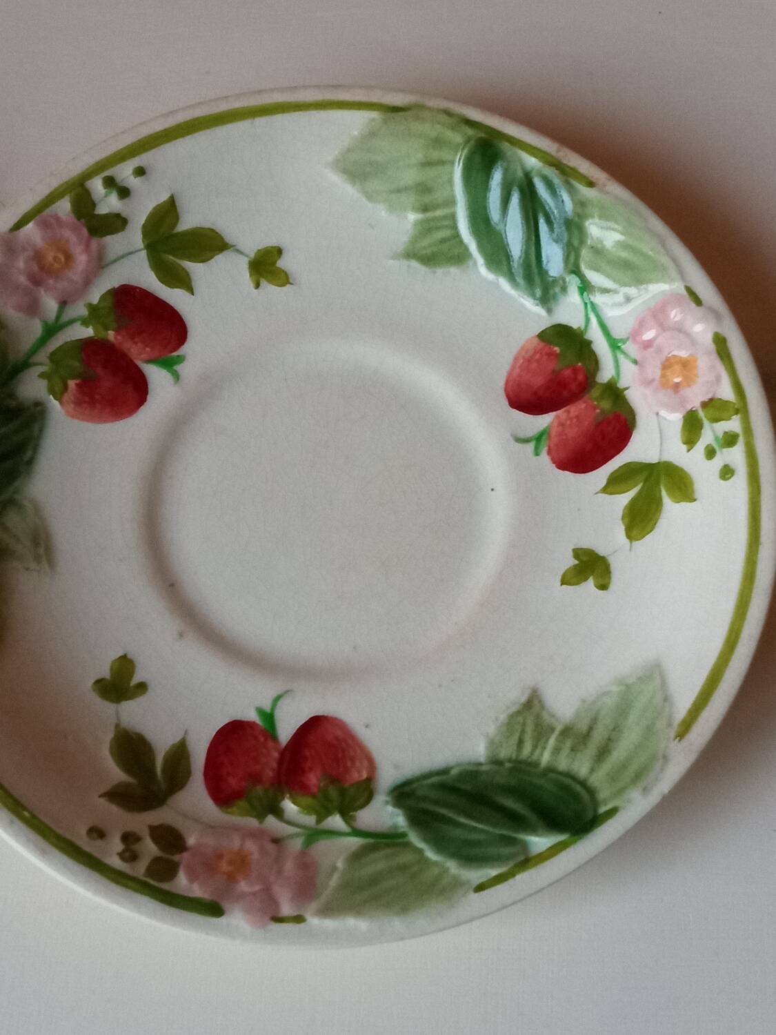 Two earthenware plates, H B, Choisy le roi