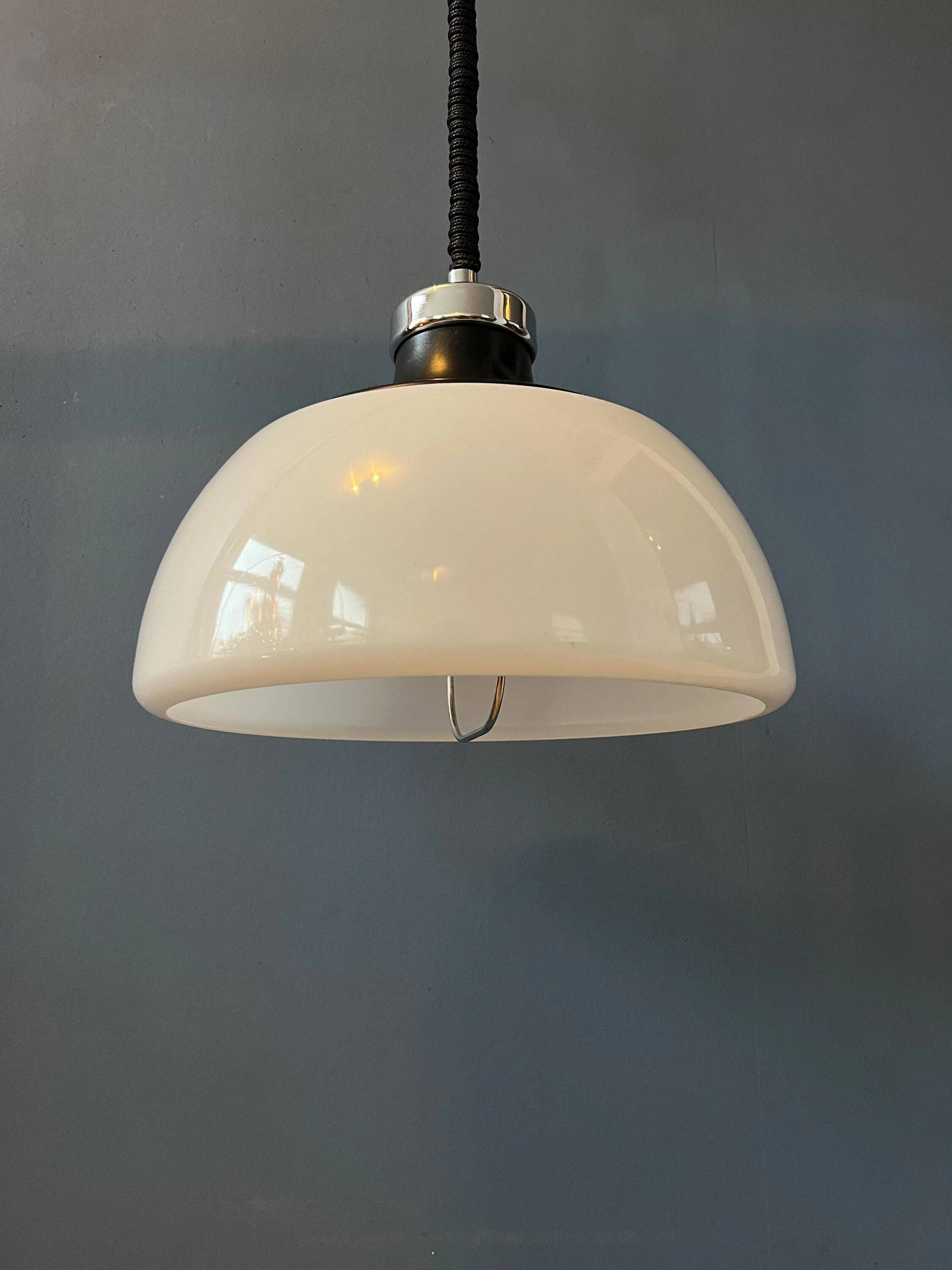 Massive Space Age Mid-Century suspension in plexiglass with white acrylic shade.