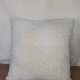 Off-white buckle cushion