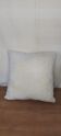 Coussin bouclettes blanc cassé