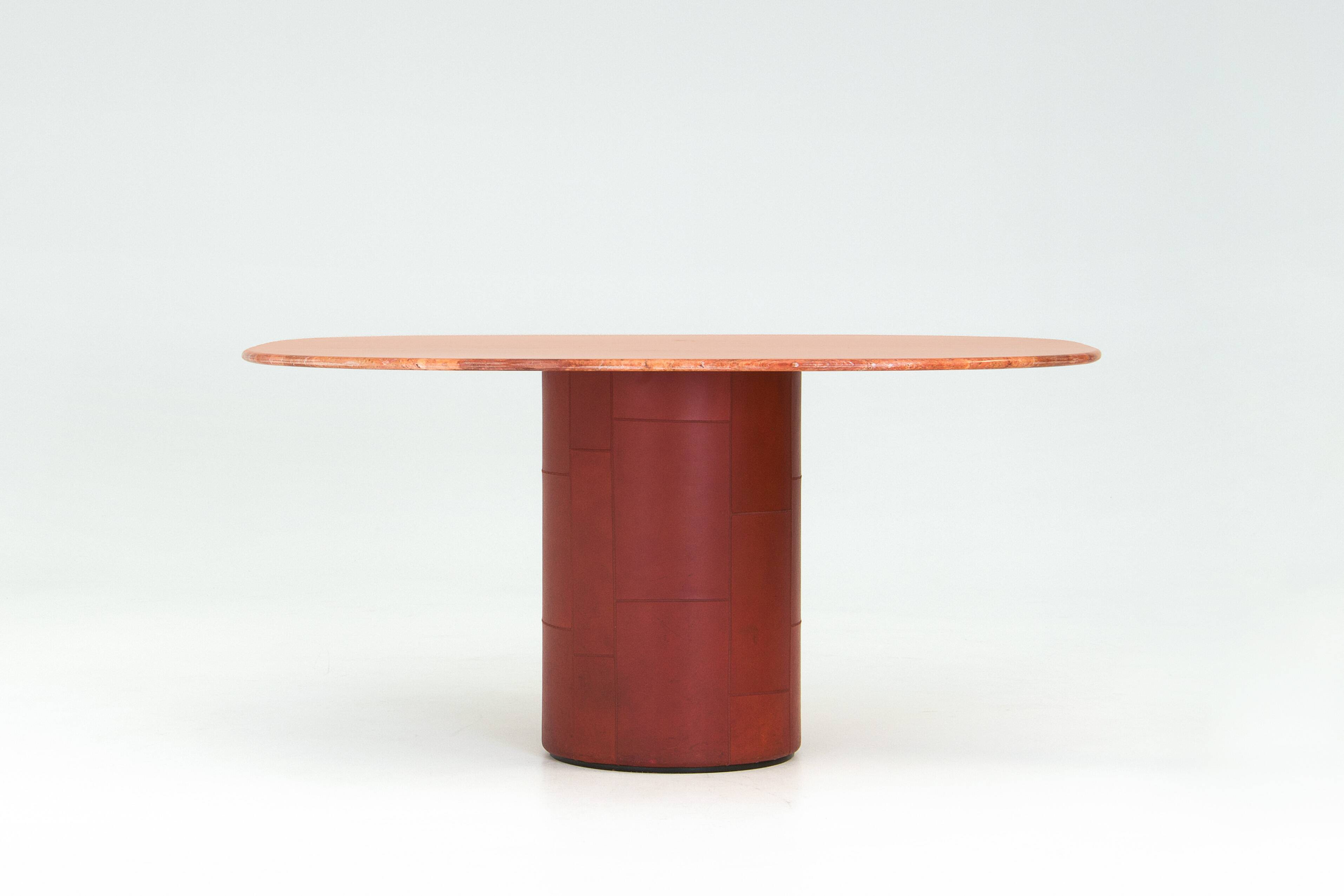 Dining table 'Tobia' in red travertine