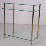 Hollywood Regency side table with gold-colored legs