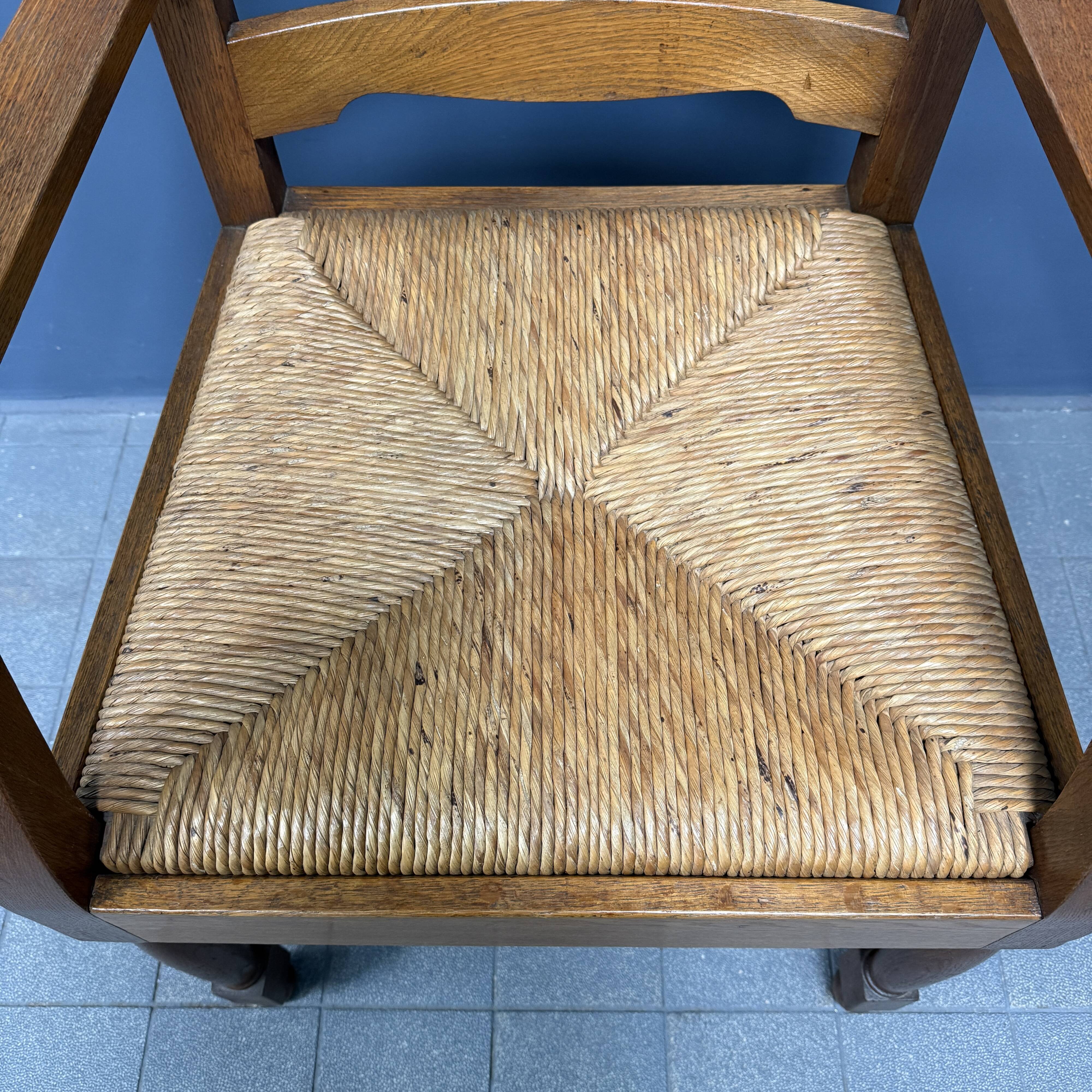 Set of two Dutch oak armchairs with rush seats