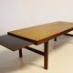 Table basse en teck avec feuille d'extension noire, design danois, années 1960.