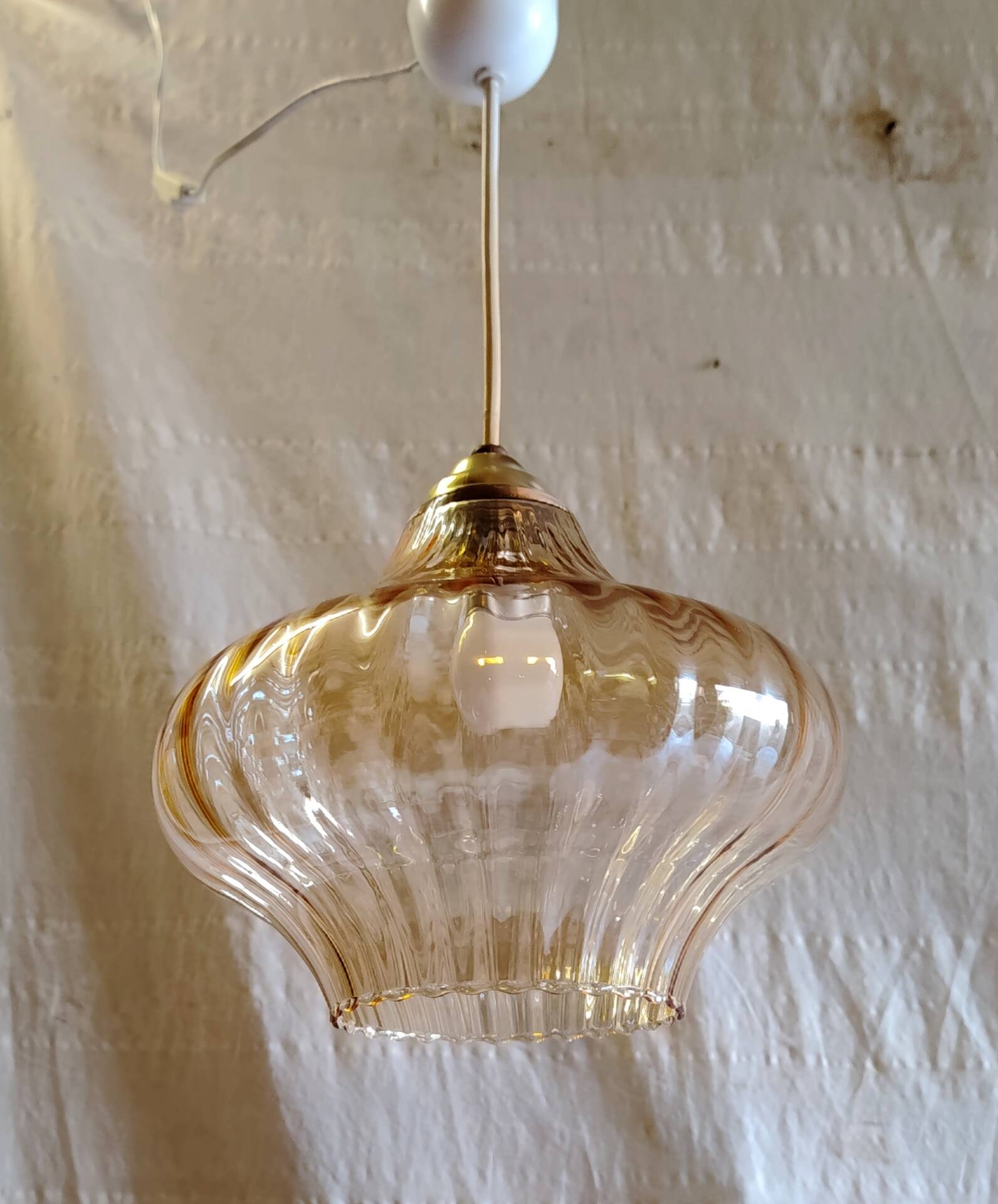 70's amber glass suspension design
