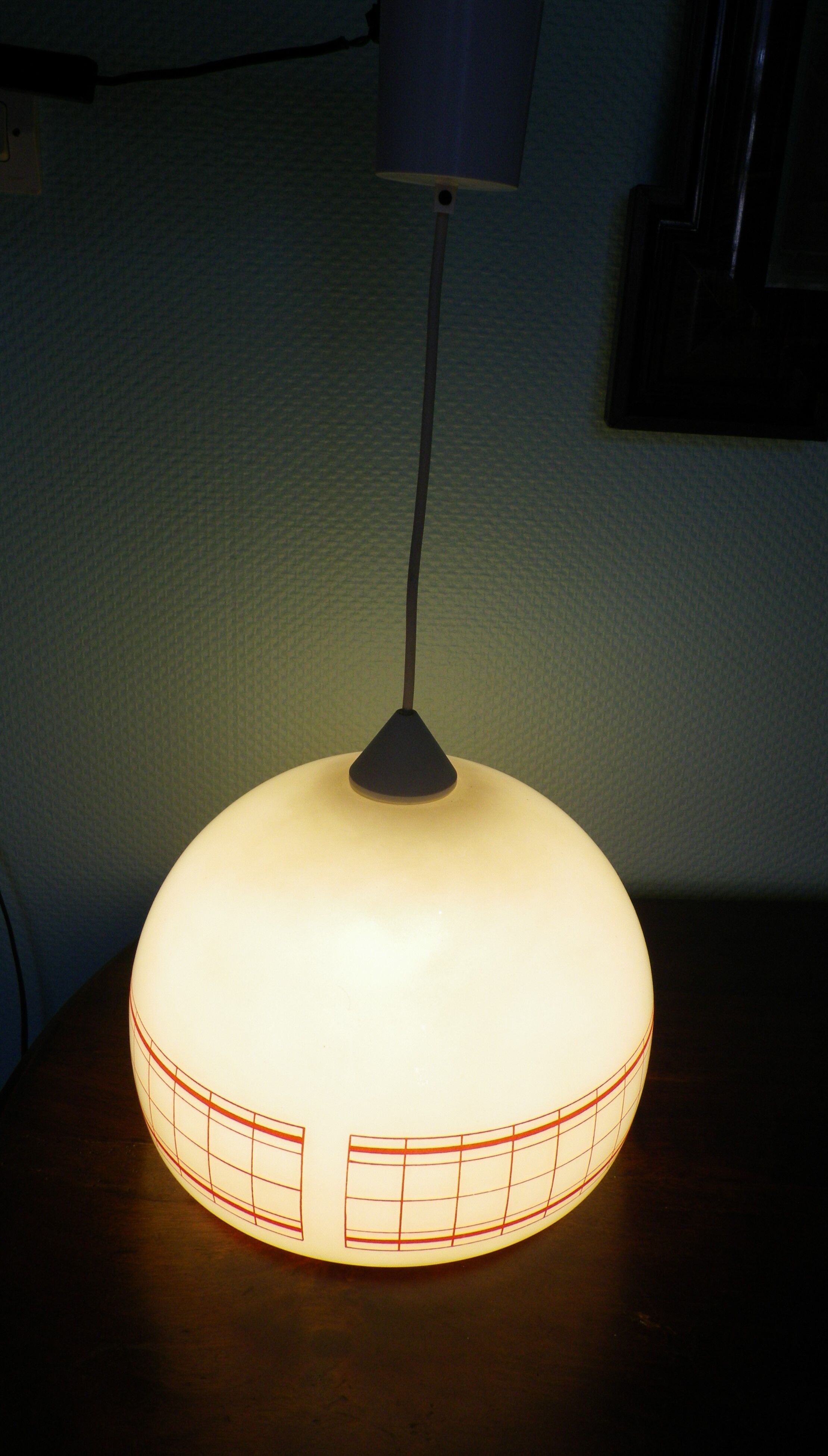 Space age pendant lamp, white opaline with orange silkscreened geometric designs