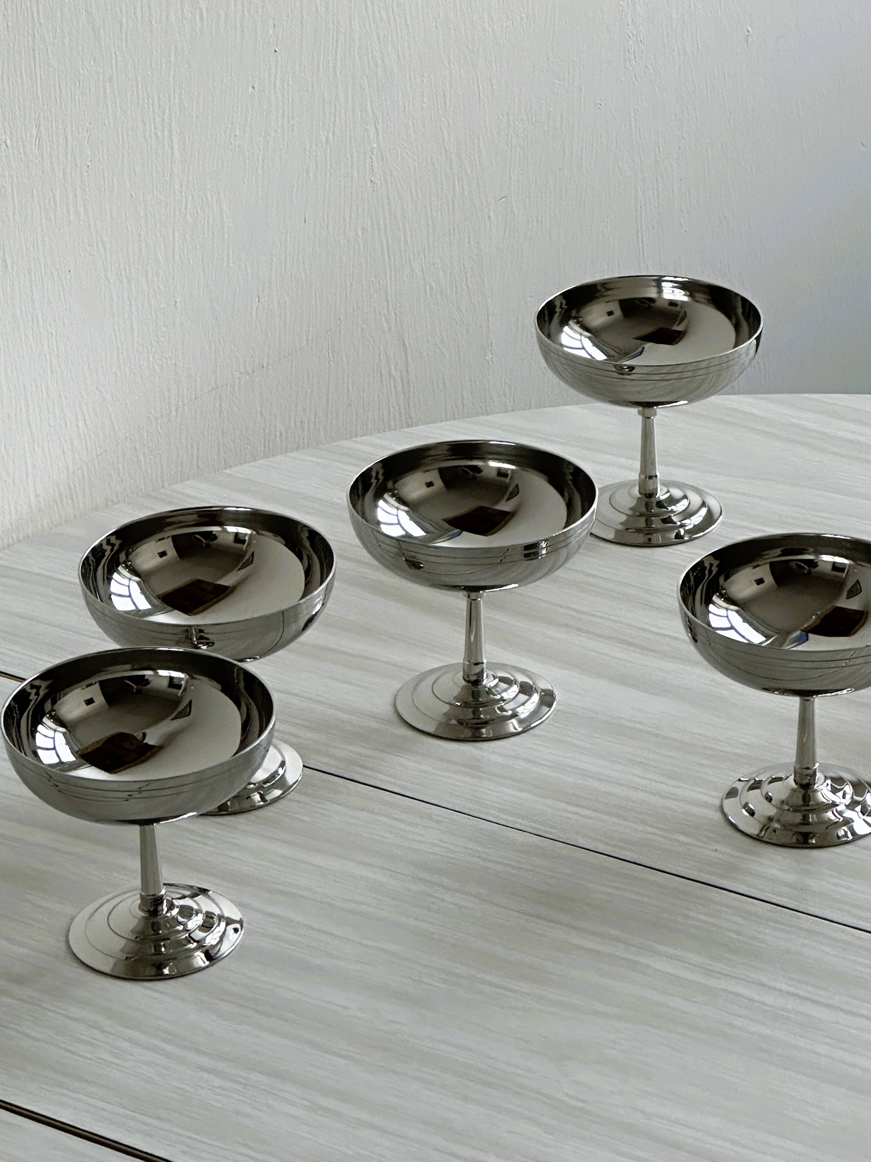6 stainless steel standing cups, Letang Remy, France.