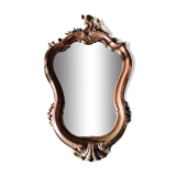 Pretty Baroque style mirror / Louis XV patinated with pink / golden copper reflections. Volutes, leafy shells