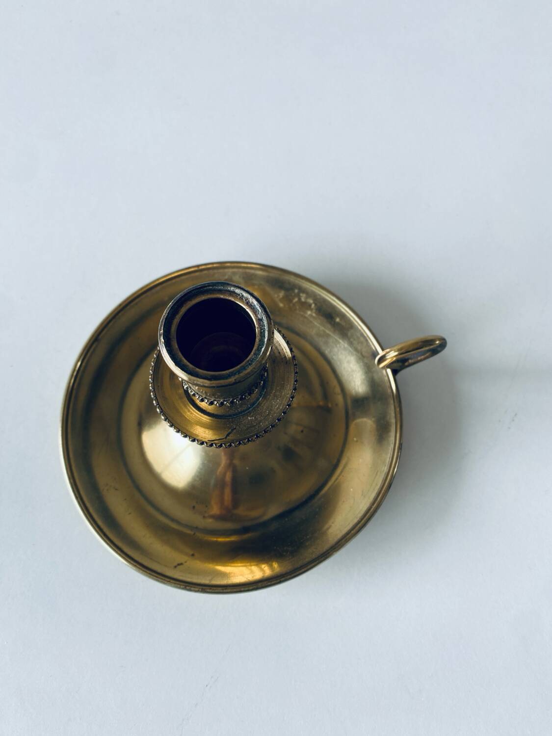 Candle holder with brass handle