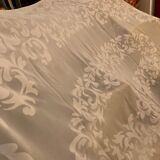 Set white tablecloth and 12 matching towels, hand embroidered