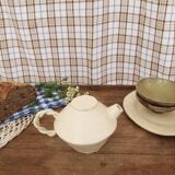 White stoneware teapot
