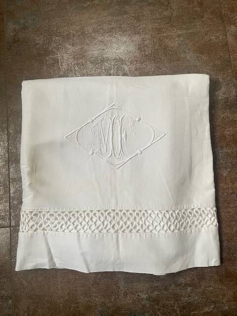 Similar listings: Antique cotton sheet embroidered with the monogram MF