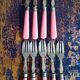 9 brass cake forks - vintage Bakelite handle