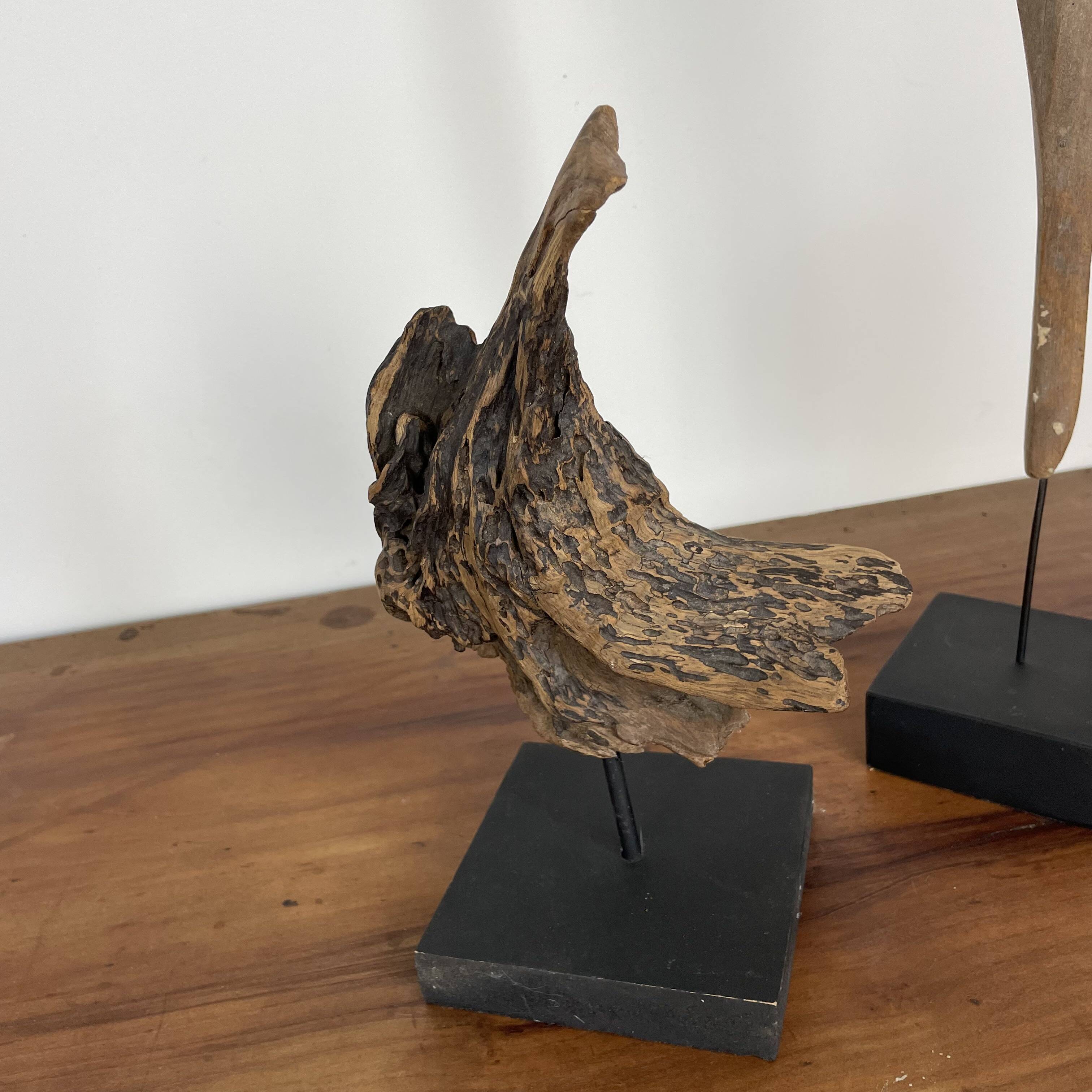 Set of 2 wooden sculptures on base