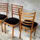 Set of 4 vintage wooden chairs with faux leather.