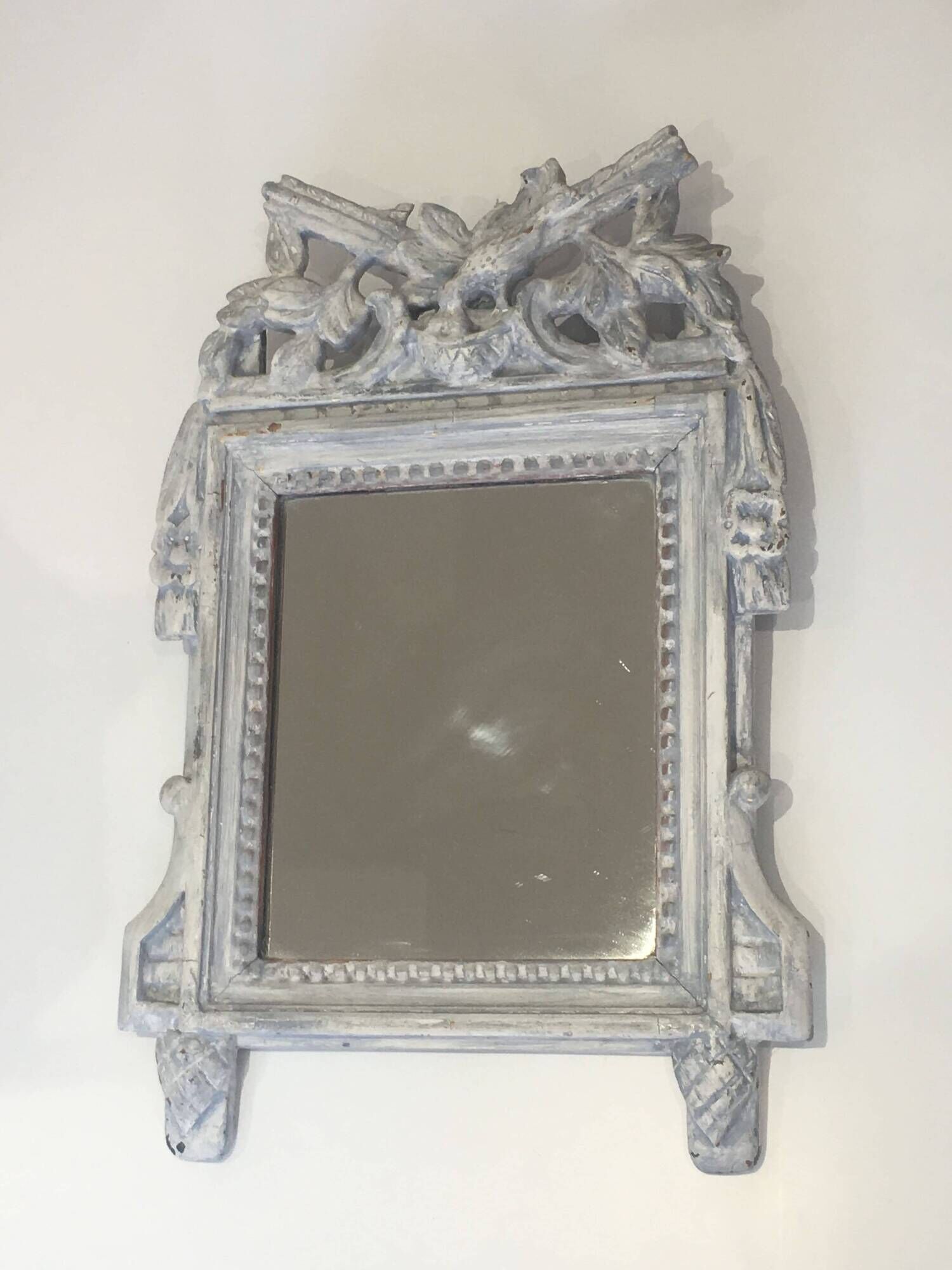 Louis XVI Style Mirror in Carved Wood with Grey Patina and Dove Pediment