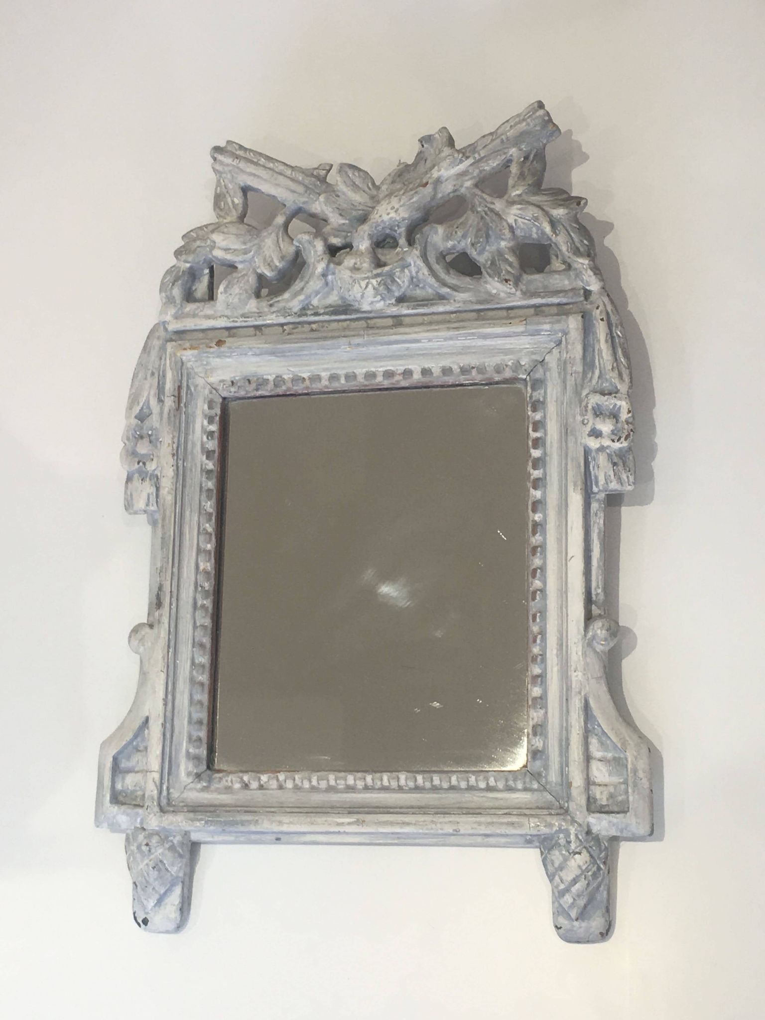 Louis XVI Style Mirror in Carved Wood with Grey Patina and Dove Pediment