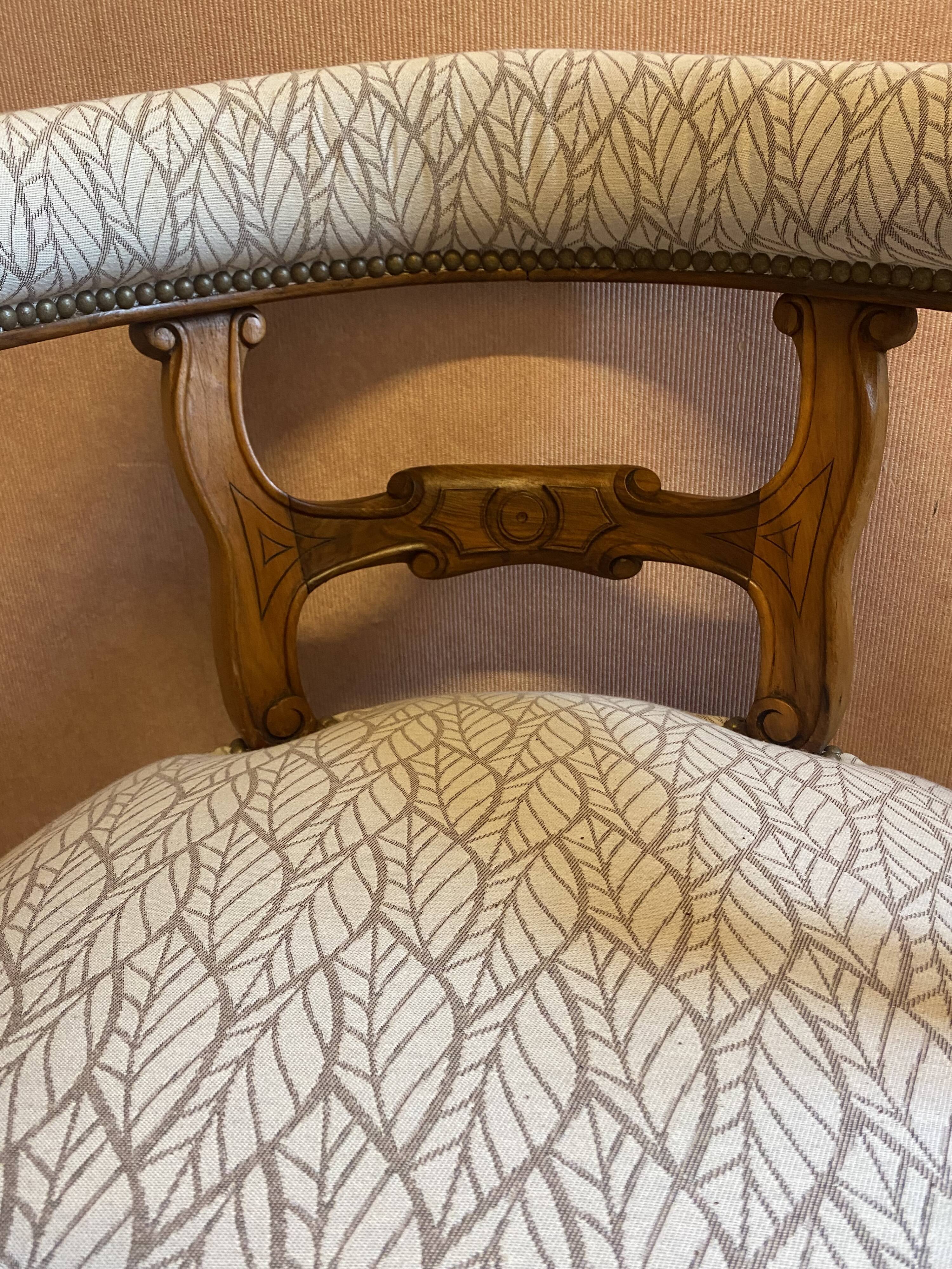 office armchair in walnut, nineteenth century, fully trimmed and reupholstered.