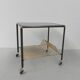 Vintage coffee table on castors with singles rack