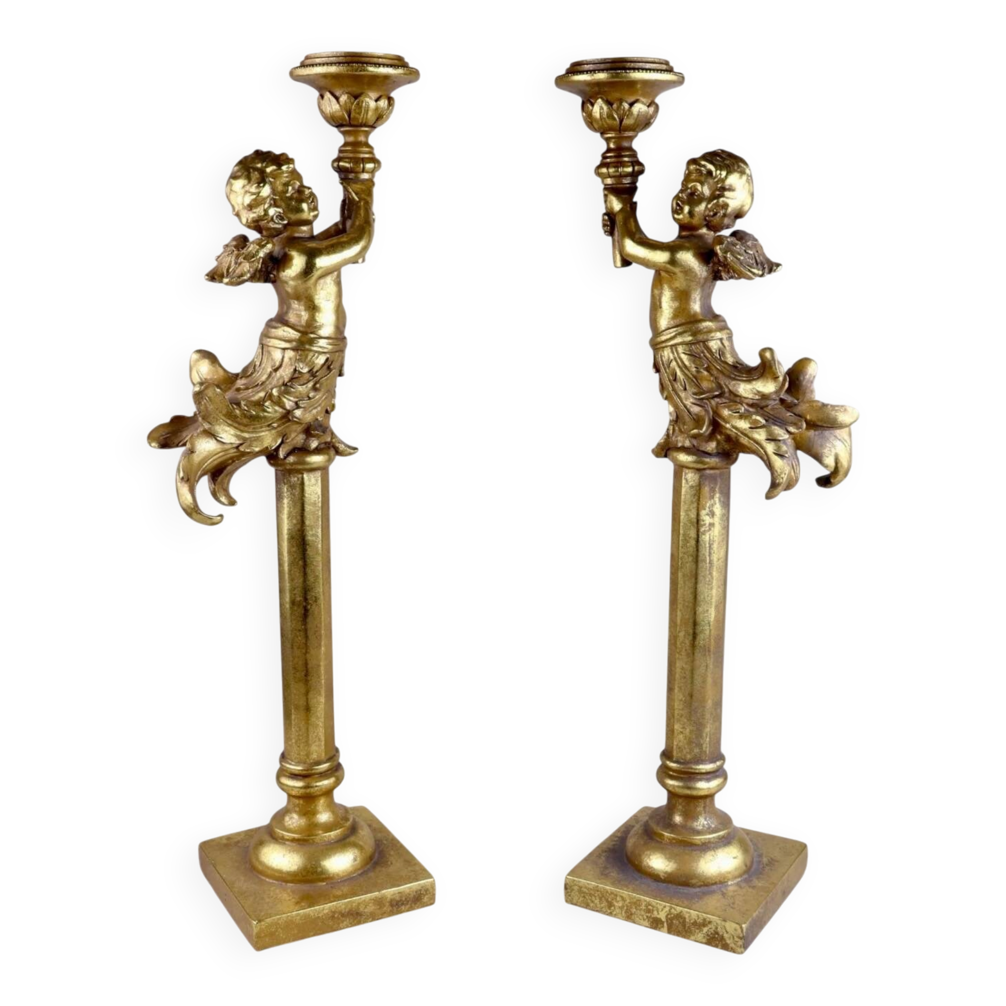 Pair of large candlesticks with cherubs