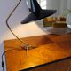 Brass table lamp on a tripod in modern Swedish style, Sweden, 1950.