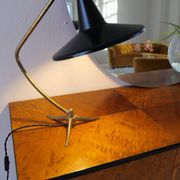 Brass table lamp on a tripod in modern Swedish style, Sweden, 1950.