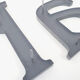 "Ah." sign letters from the patinated grey 70s
