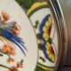 Two Raynaud Limoges plates and Tetard brothers silver.