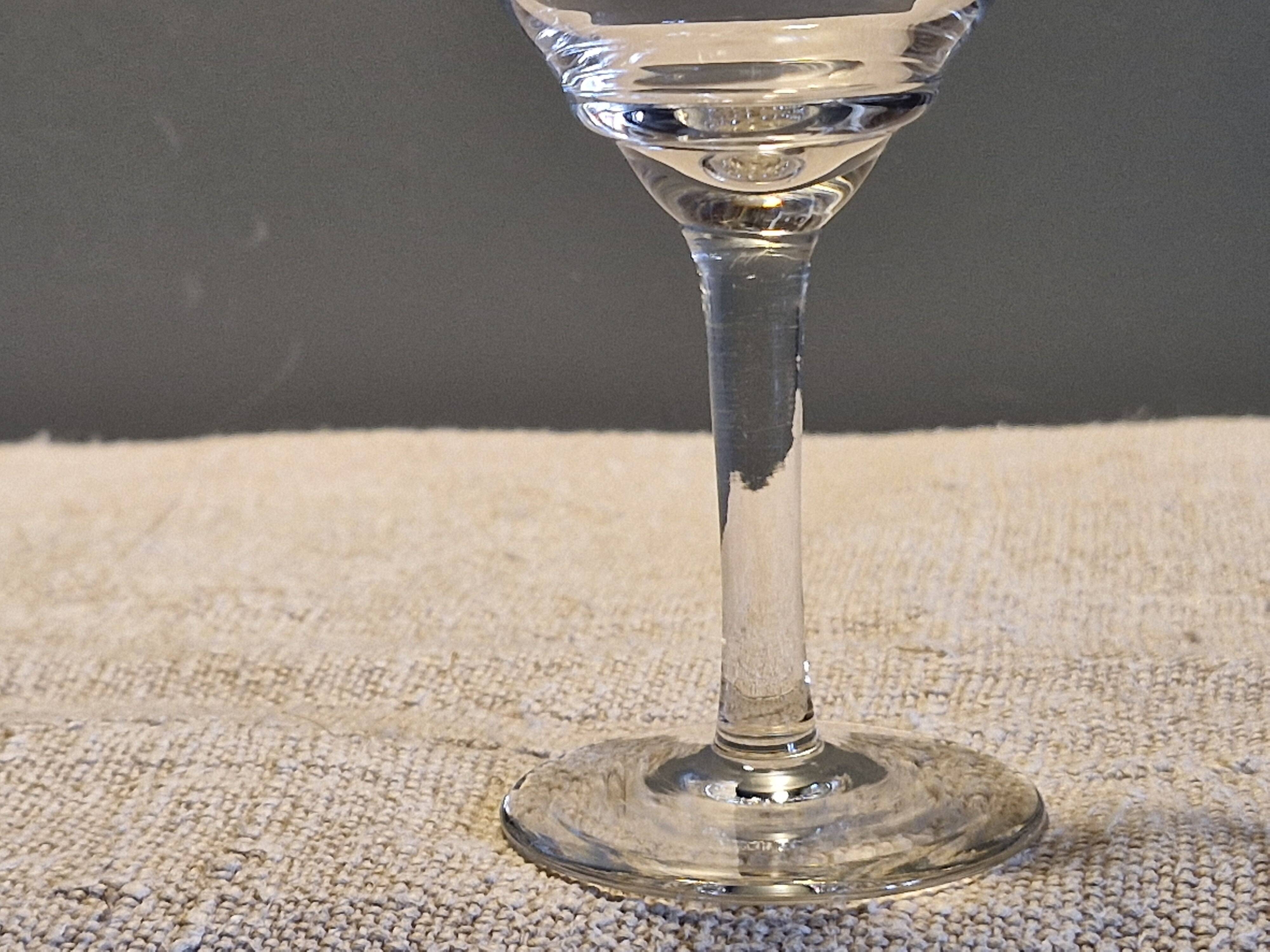 7 antique white wine/port glasses in crystal in excellent condition.