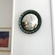 Round ceramic mirror 1960