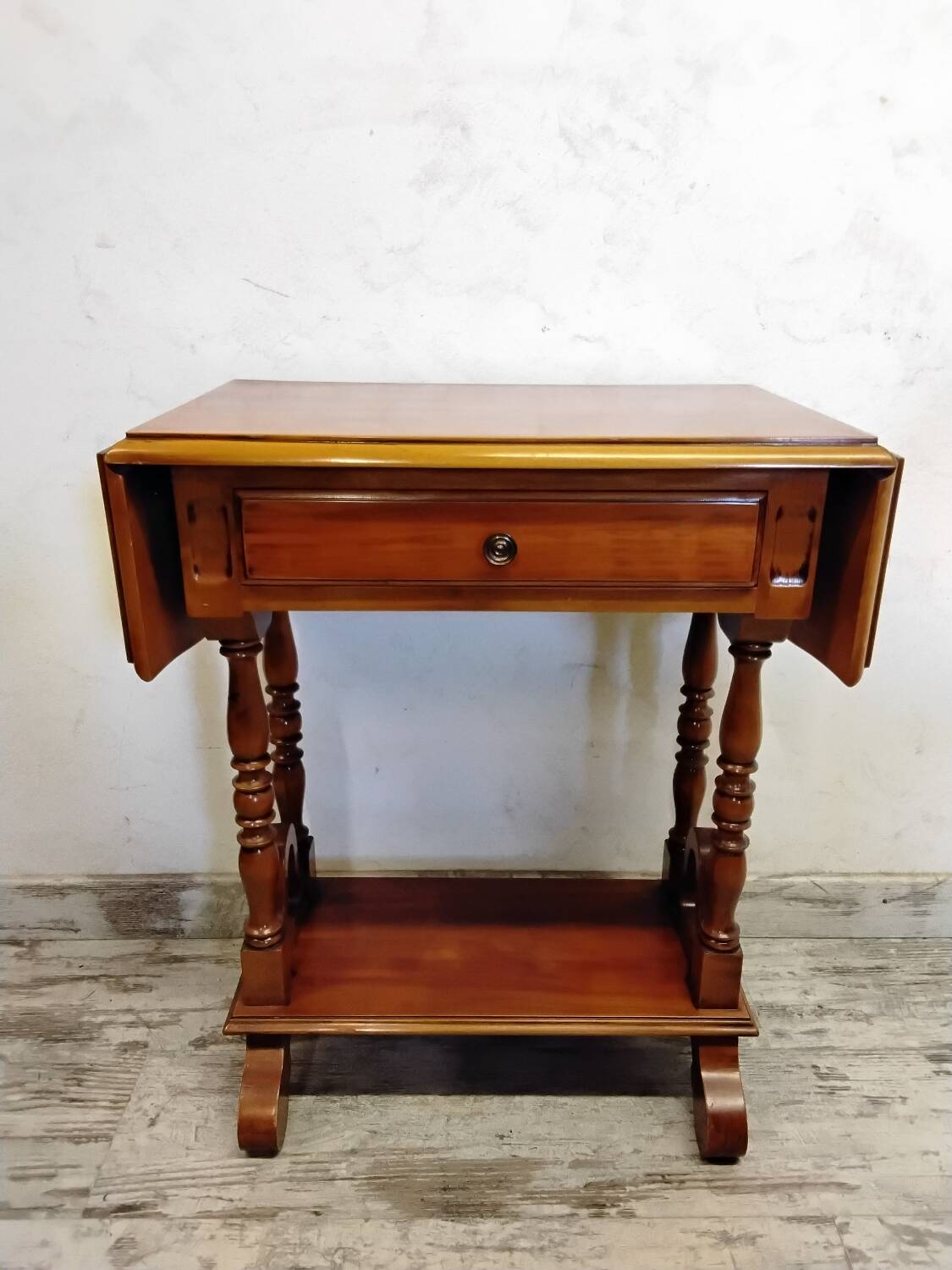 Small wooden drop-leaf table