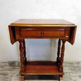Small wooden drop-leaf table